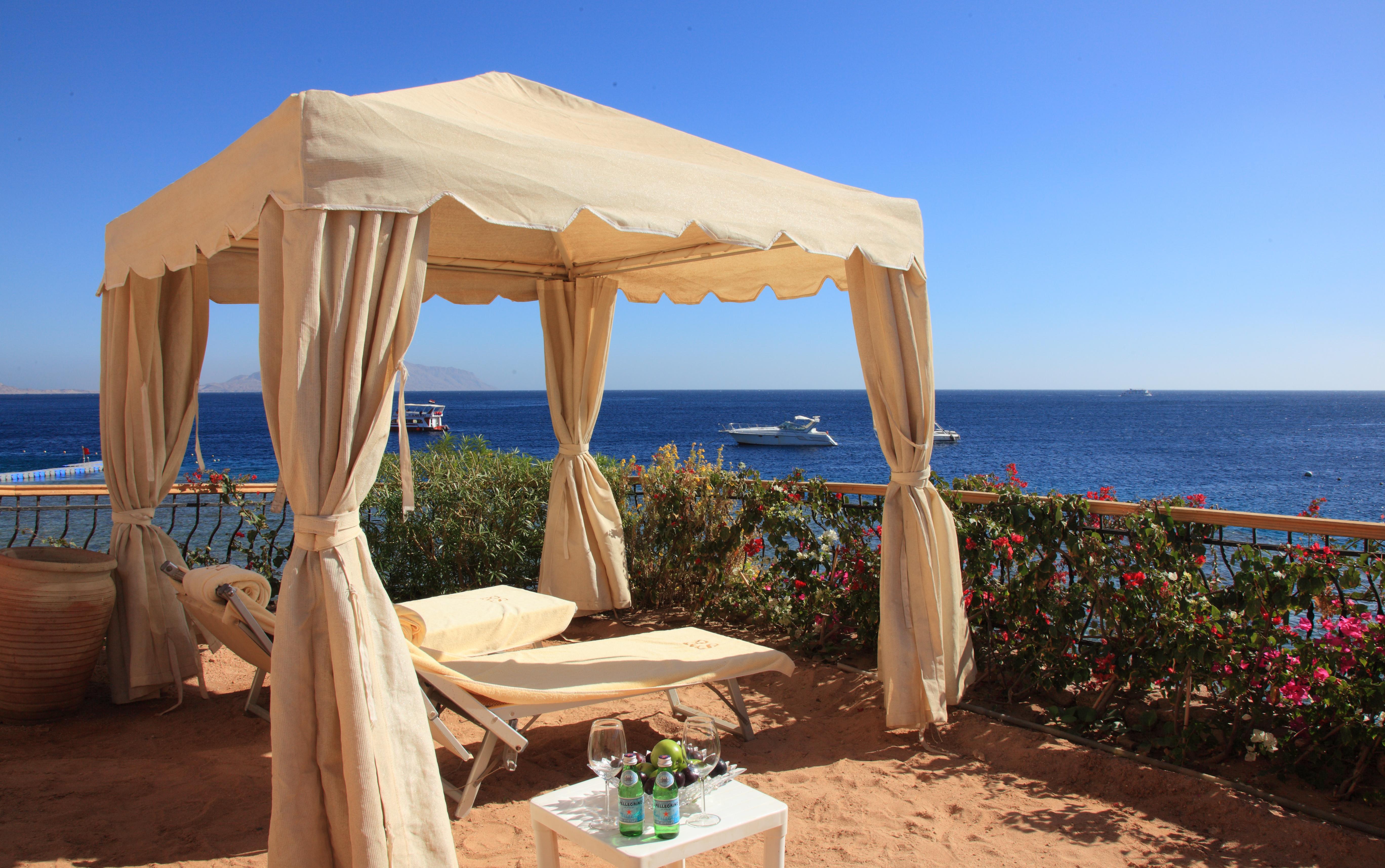 Hotel Royal Savoy Sharm El Sheikh Exterior foto A beach in Sharm El Sheikh