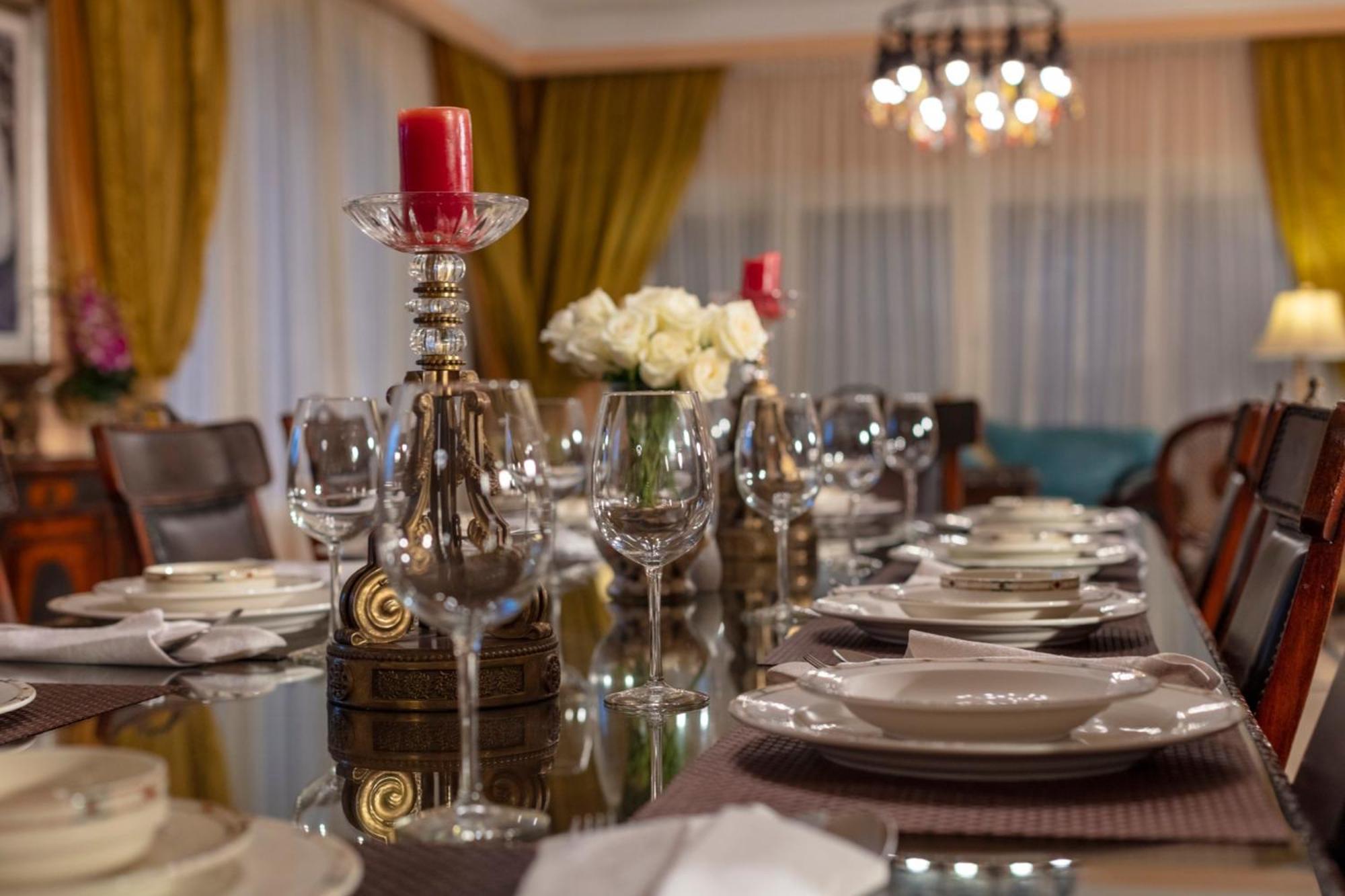Hotel Royal Savoy Sharm El Sheikh Exterior foto A table set for a formal dinner